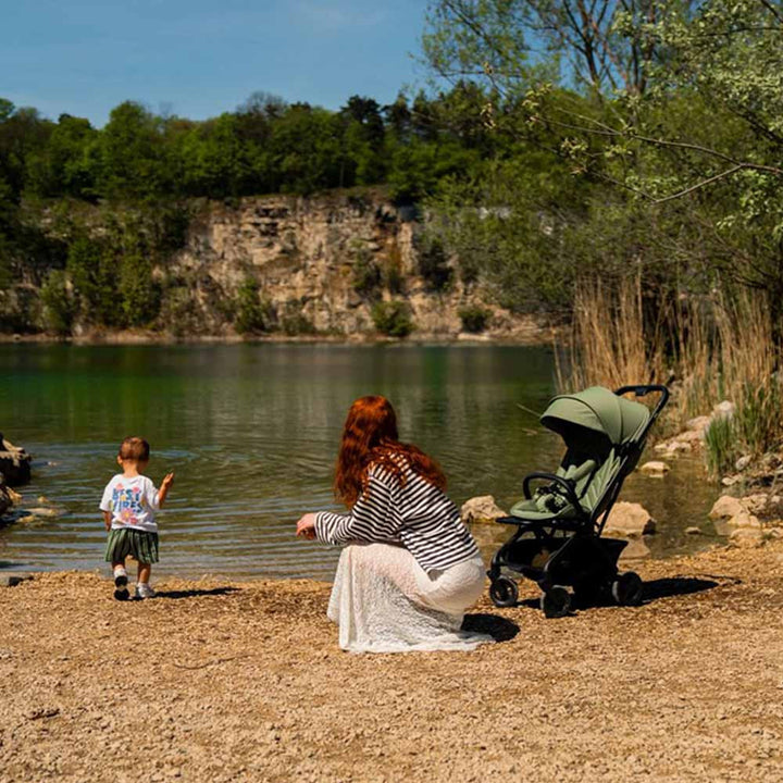 Avionaut Airby compact stroller on a family day out